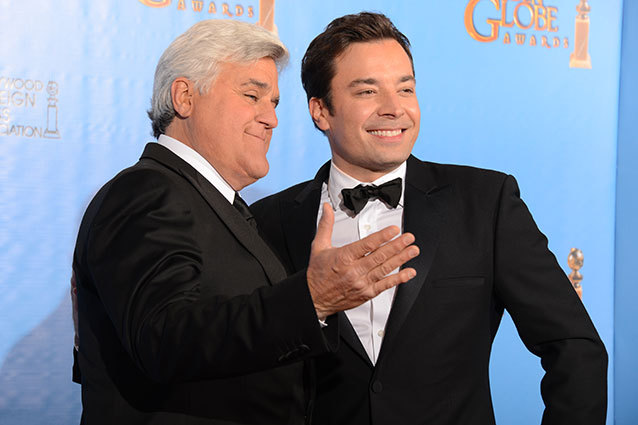 Jay Leno and Jimmy Fallon walked the red carpet during the 2014 Golden Globe Awards.  The two pose together just weeks before Lenos final Tonight Show.