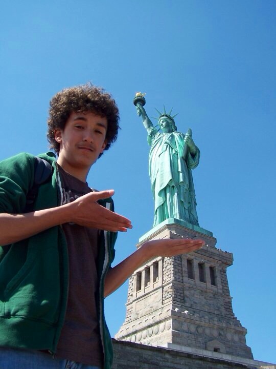 SCA Vice President Blane Hornung poses with the Statue of Liberty, showing his obvious enthusiasm for architecture.  Hornung said that winning Mr. PFHS would mean a legacy worthy enough for the history books and a trip to Disney World. 