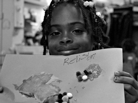 Missing girl Relisha Rudd holding up school art work. She has been missing since March 8.
