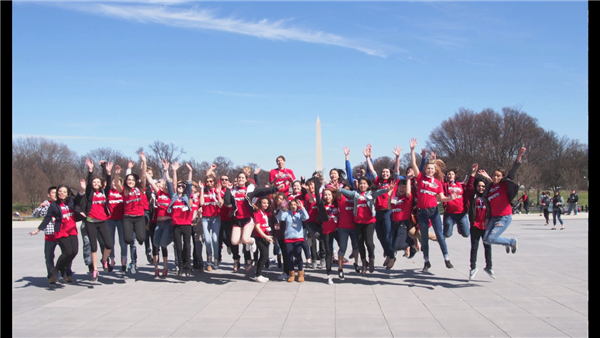 Both Loudoun County and foreign exchange students posing in front of The Monument during their tour of Washington, D.C.