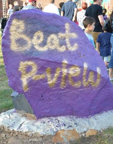 The Rock in front of the school is painted for Homecoming, cheering on the football team before their big game. 