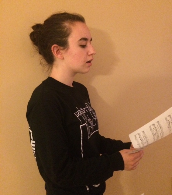 Senior+Abby+Firsching+read+over+her+sheet+music+to+prepare+herself+for+the+All-County+choir+audition.++All-County+choir+places+a+high+emphasis+on+sight+singing+as+it+is+a+skill+that+all+aspiring+singers+need+to+have.+