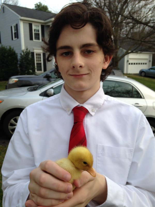 Anthony+takes+a+picture+with+a+duck.+He+cares+about+all+living+things.
